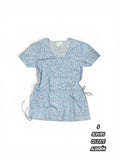 Casaca Scrubs - Celeste, estampado floral (Talla S)